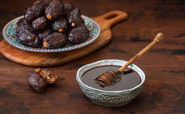 طرز تهیه شیره خرما خانگی خوشمزه طرز تهیه شیره خرما خانگی خوشمزه